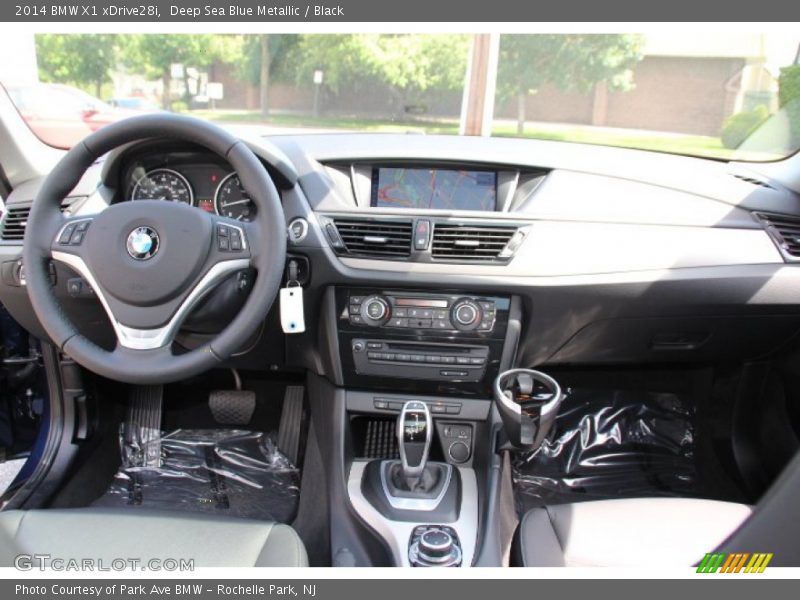 Deep Sea Blue Metallic / Black 2014 BMW X1 xDrive28i