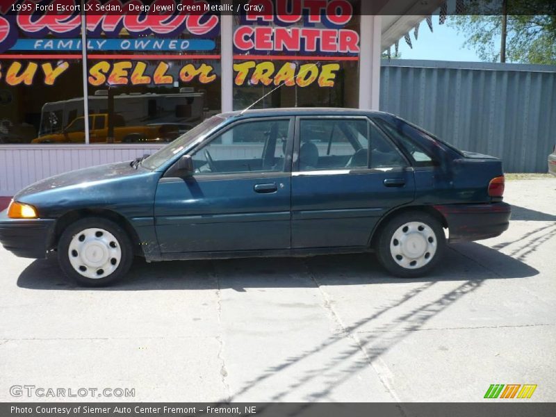 Deep Jewel Green Metallic / Gray 1995 Ford Escort LX Sedan