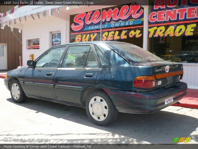 Deep Jewel Green Metallic / Gray 1995 Ford Escort LX Sedan