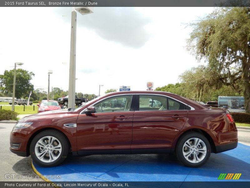  2015 Taurus SEL Bronze Fire Metallic