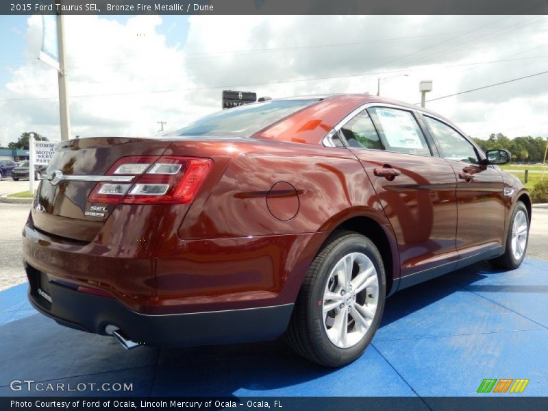  2015 Taurus SEL Bronze Fire Metallic