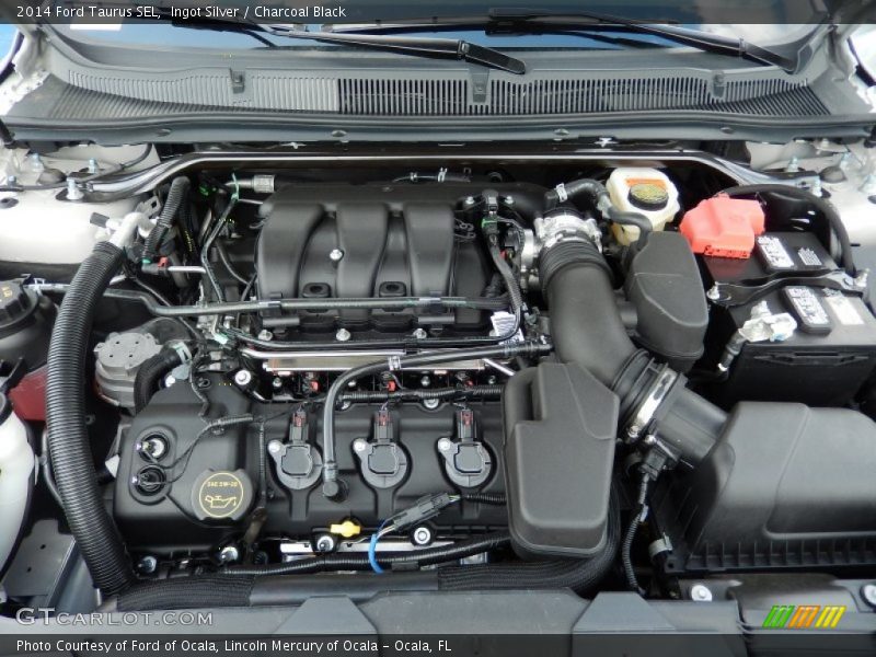 Ingot Silver / Charcoal Black 2014 Ford Taurus SEL
