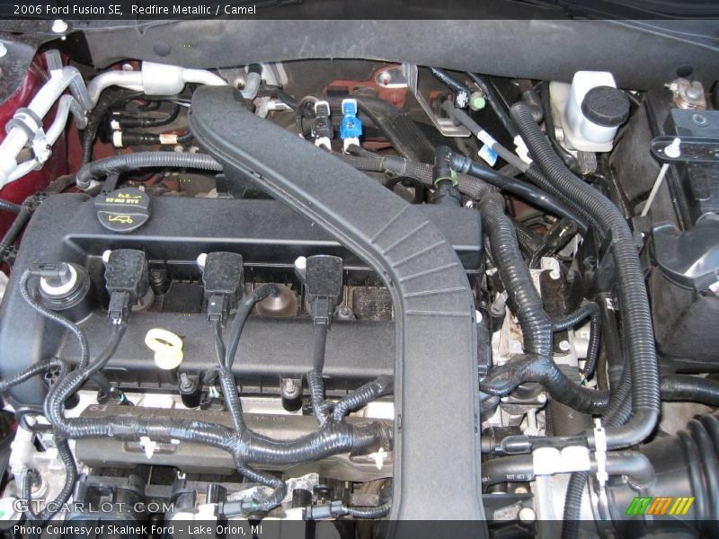 Redfire Metallic / Camel 2006 Ford Fusion SE
