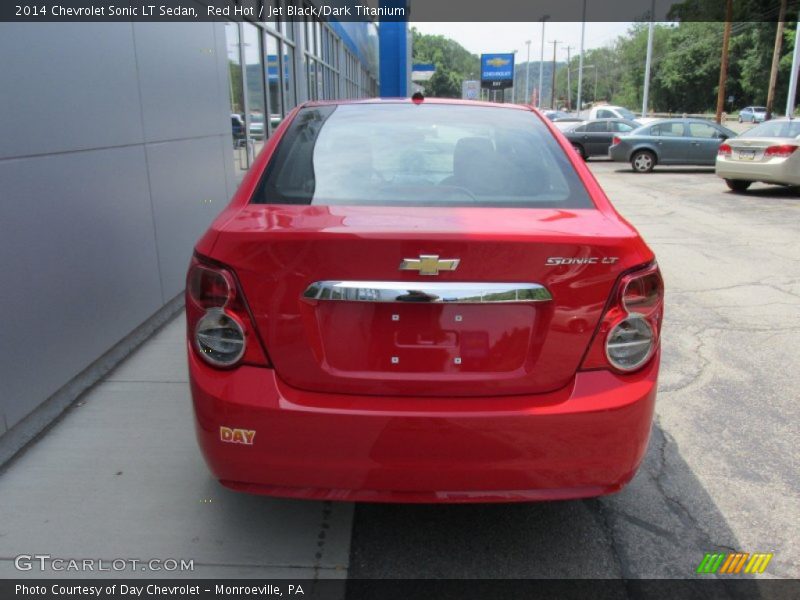 Red Hot / Jet Black/Dark Titanium 2014 Chevrolet Sonic LT Sedan