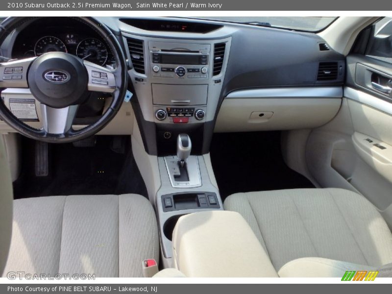 Satin White Pearl / Warm Ivory 2010 Subaru Outback 2.5i Premium Wagon