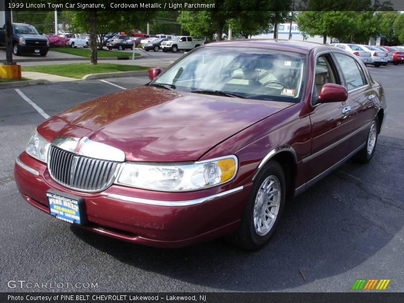 Cordovan Metallic / Light Parchment 1999 Lincoln Town Car Signature