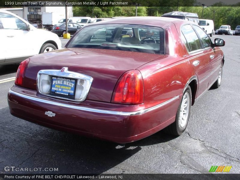 Cordovan Metallic / Light Parchment 1999 Lincoln Town Car Signature