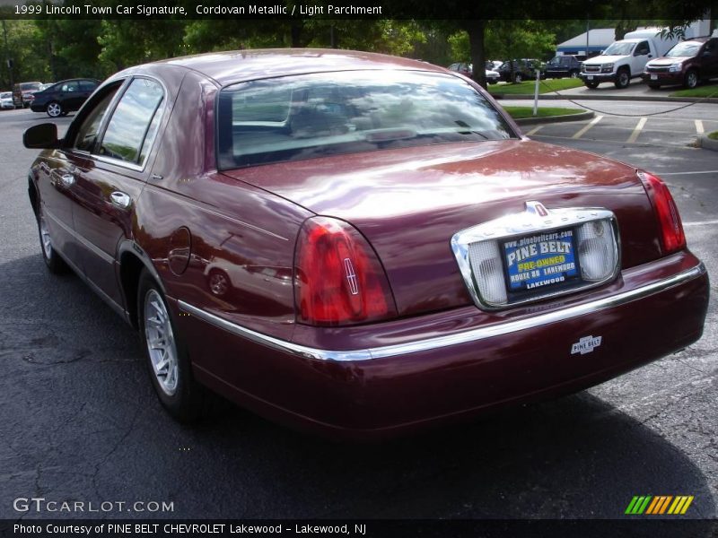 Cordovan Metallic / Light Parchment 1999 Lincoln Town Car Signature