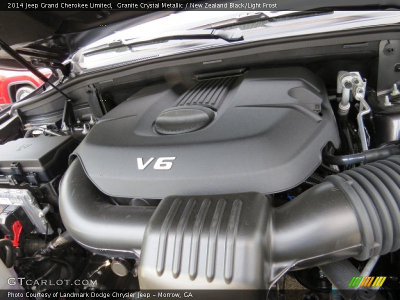 Granite Crystal Metallic / New Zealand Black/Light Frost 2014 Jeep Grand Cherokee Limited