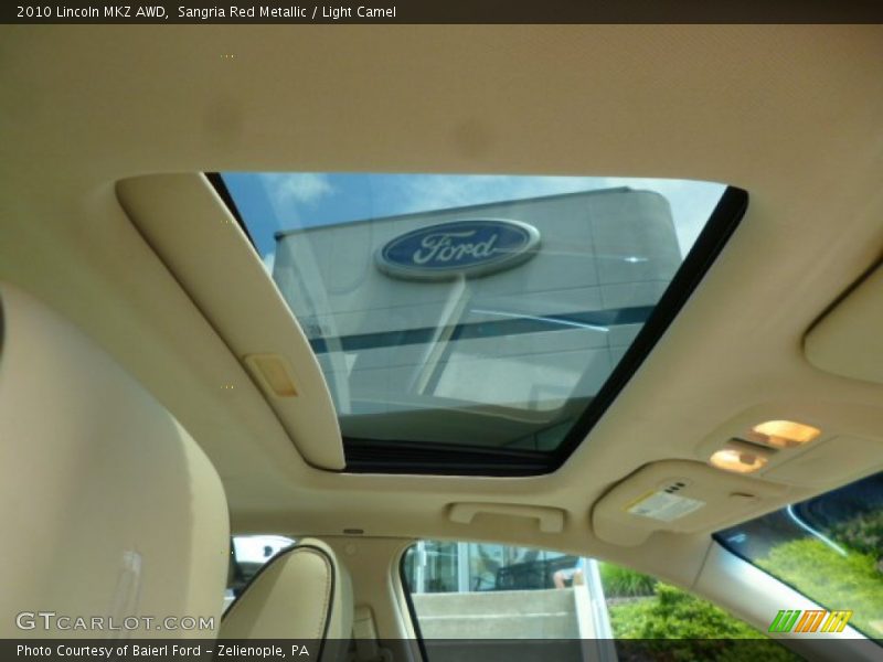 Sangria Red Metallic / Light Camel 2010 Lincoln MKZ AWD