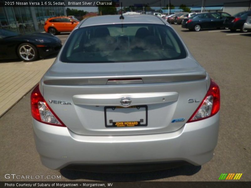 Brilliant Silver / Charcoal 2015 Nissan Versa 1.6 SL Sedan