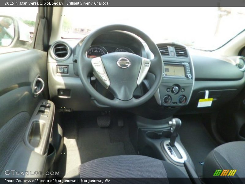 Brilliant Silver / Charcoal 2015 Nissan Versa 1.6 SL Sedan
