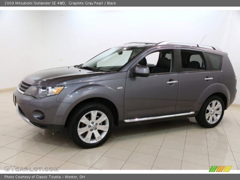 Front 3/4 View of 2009 Outlander SE 4WD