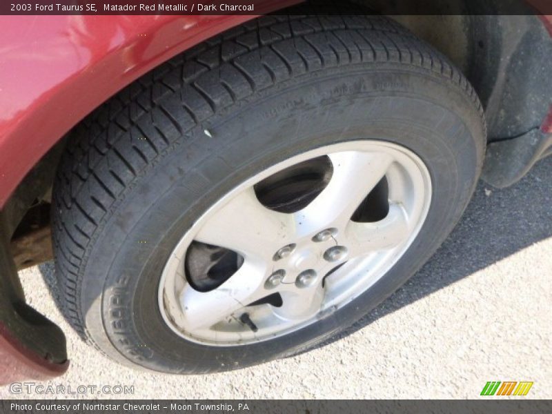 Matador Red Metallic / Dark Charcoal 2003 Ford Taurus SE