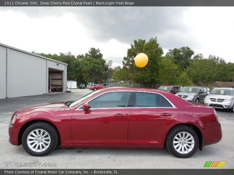 Deep Cherry Red Crystal Pearl / Black/Light Frost Beige 2011 Chrysler 300