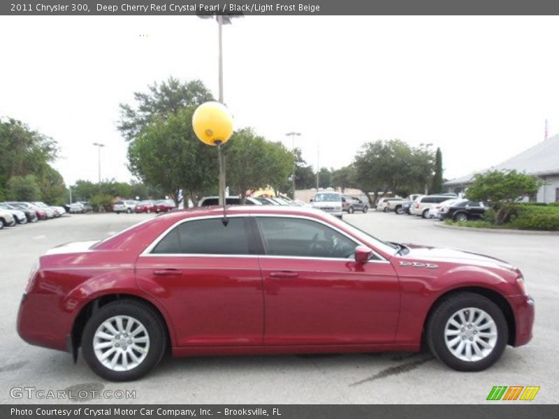 Deep Cherry Red Crystal Pearl / Black/Light Frost Beige 2011 Chrysler 300