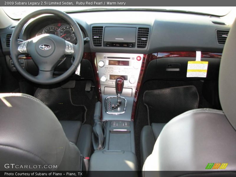 Ruby Red Pearl / Warm Ivory 2009 Subaru Legacy 2.5i Limited Sedan