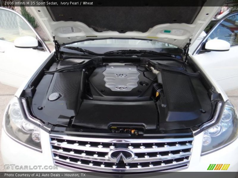 Ivory Pearl / Wheat 2006 Infiniti M 35 Sport Sedan