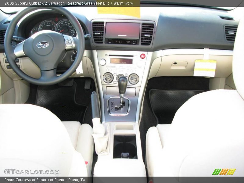 Seacrest Green Metallic / Warm Ivory 2009 Subaru Outback 2.5i Wagon