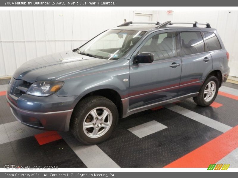 Front 3/4 View of 2004 Outlander LS AWD