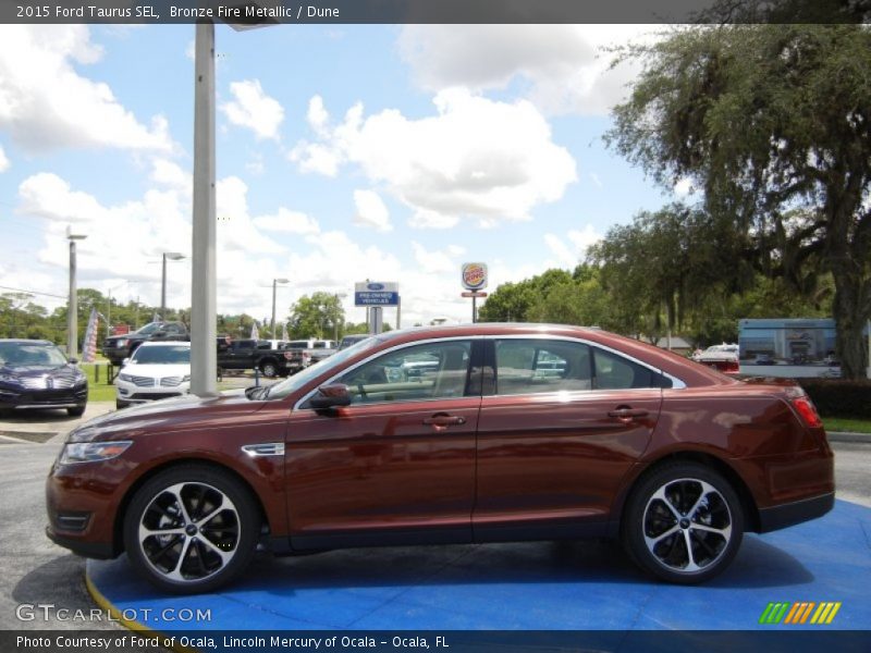  2015 Taurus SEL Bronze Fire Metallic