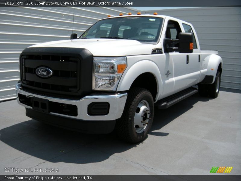 Front 3/4 View of 2015 F350 Super Duty XL Crew Cab 4x4 DRW