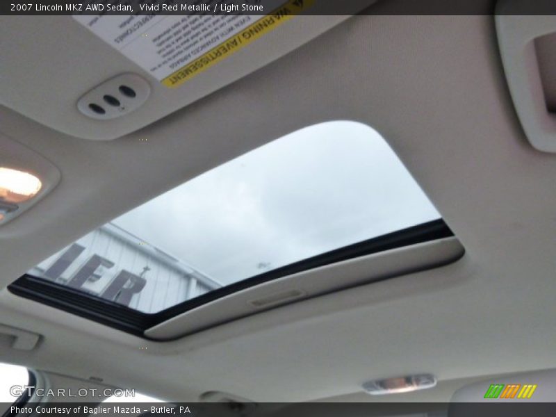 Vivid Red Metallic / Light Stone 2007 Lincoln MKZ AWD Sedan