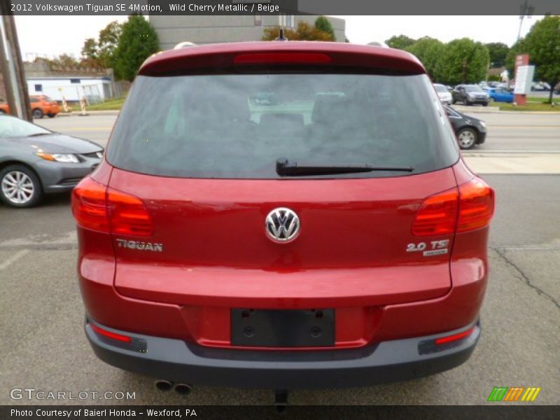 Wild Cherry Metallic / Beige 2012 Volkswagen Tiguan SE 4Motion