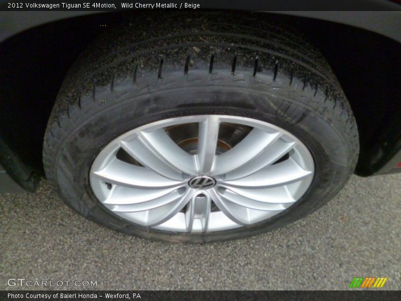 Wild Cherry Metallic / Beige 2012 Volkswagen Tiguan SE 4Motion
