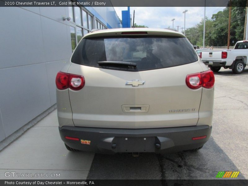 Gold Mist Metallic / Ebony 2010 Chevrolet Traverse LT