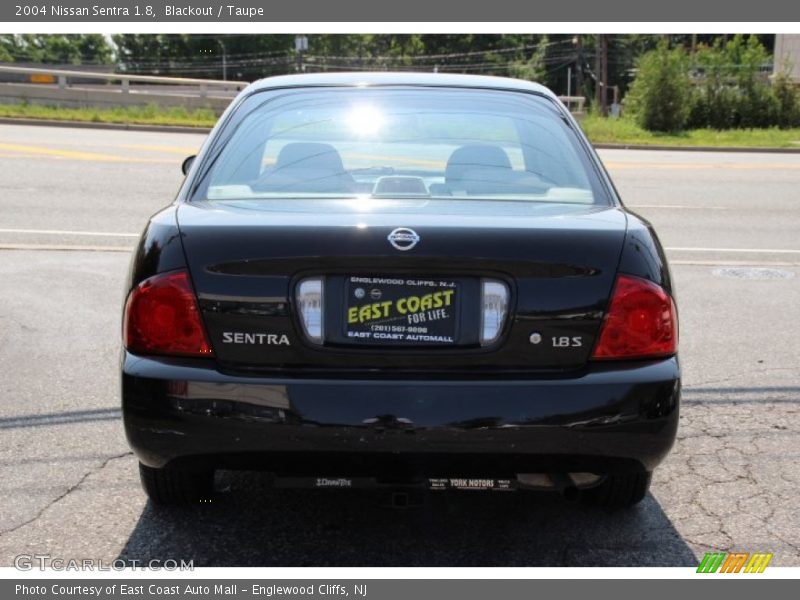 Blackout / Taupe 2004 Nissan Sentra 1.8