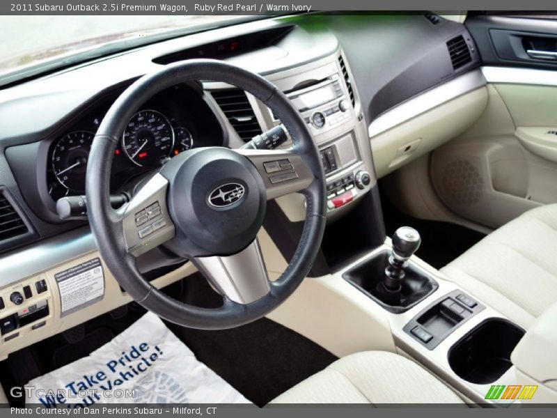 Ruby Red Pearl / Warm Ivory 2011 Subaru Outback 2.5i Premium Wagon