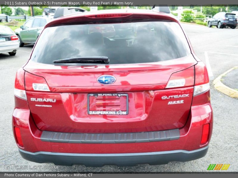 Ruby Red Pearl / Warm Ivory 2011 Subaru Outback 2.5i Premium Wagon