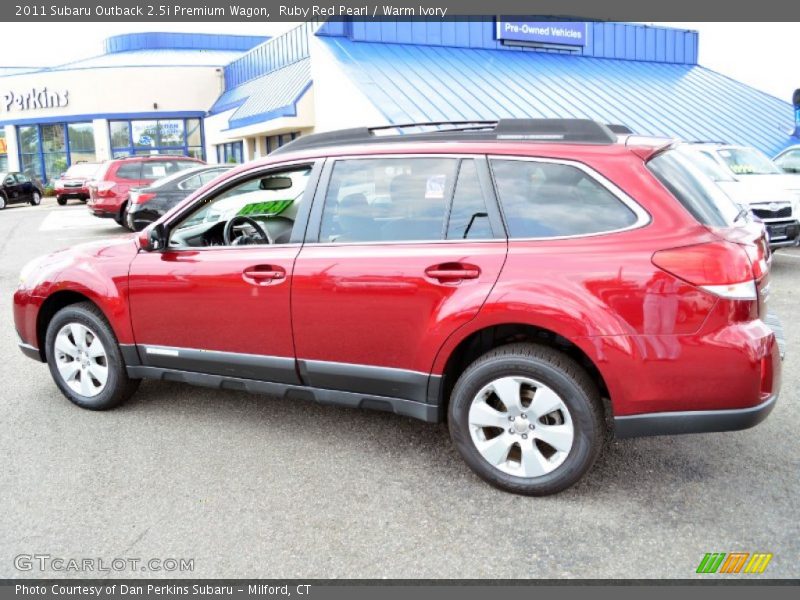 Ruby Red Pearl / Warm Ivory 2011 Subaru Outback 2.5i Premium Wagon