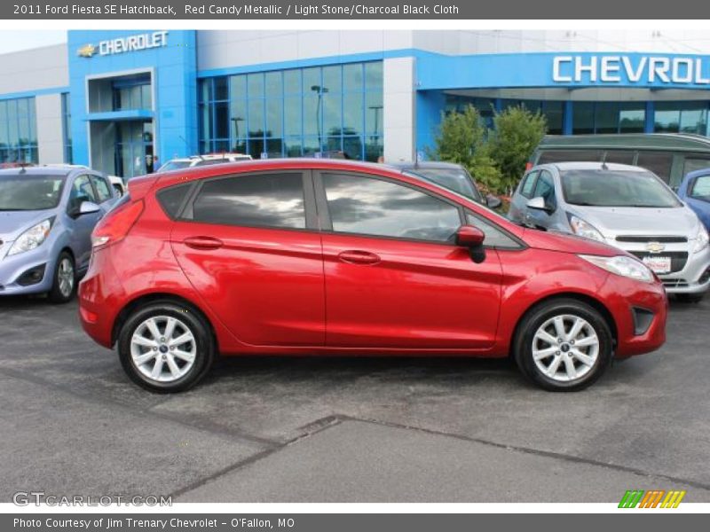 Red Candy Metallic / Light Stone/Charcoal Black Cloth 2011 Ford Fiesta SE Hatchback