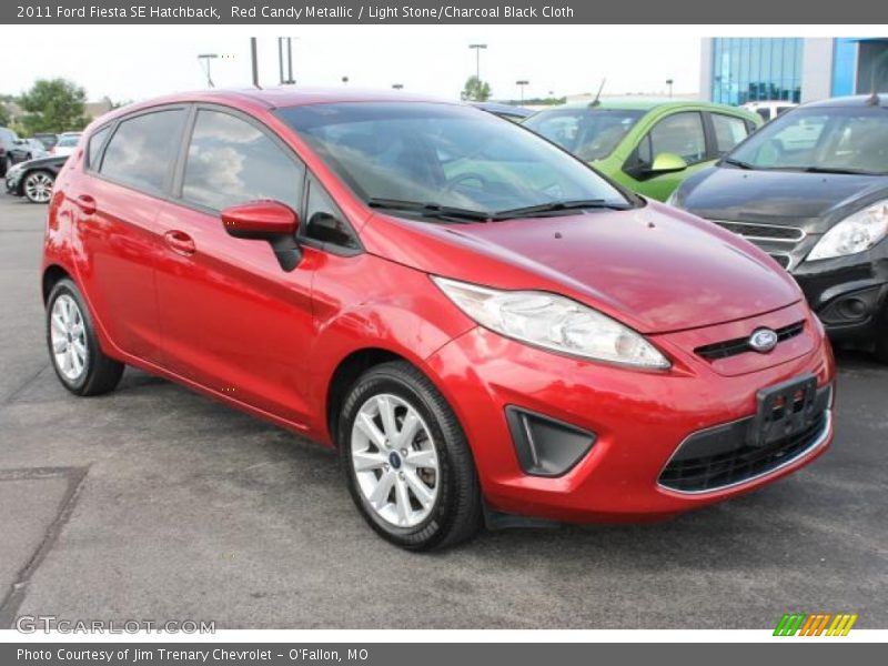 Red Candy Metallic / Light Stone/Charcoal Black Cloth 2011 Ford Fiesta SE Hatchback