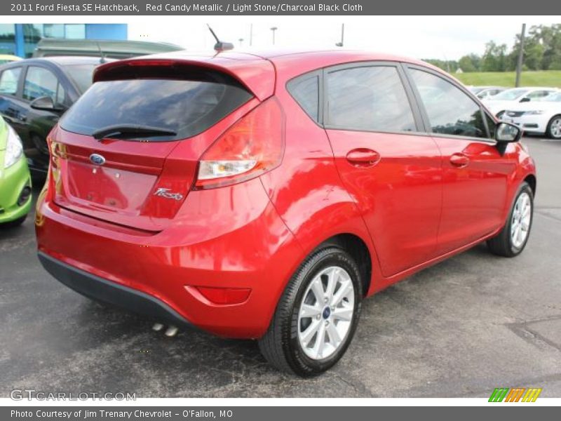 Red Candy Metallic / Light Stone/Charcoal Black Cloth 2011 Ford Fiesta SE Hatchback