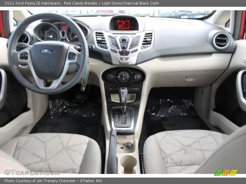 Red Candy Metallic / Light Stone/Charcoal Black Cloth 2011 Ford Fiesta SE Hatchback