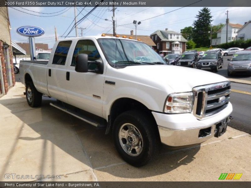Front 3/4 View of 2006 F350 Super Duty XLT Crew Cab 4x4