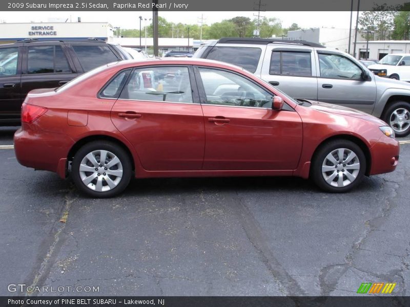 Paprika Red Pearl / Ivory 2009 Subaru Impreza 2.5i Sedan