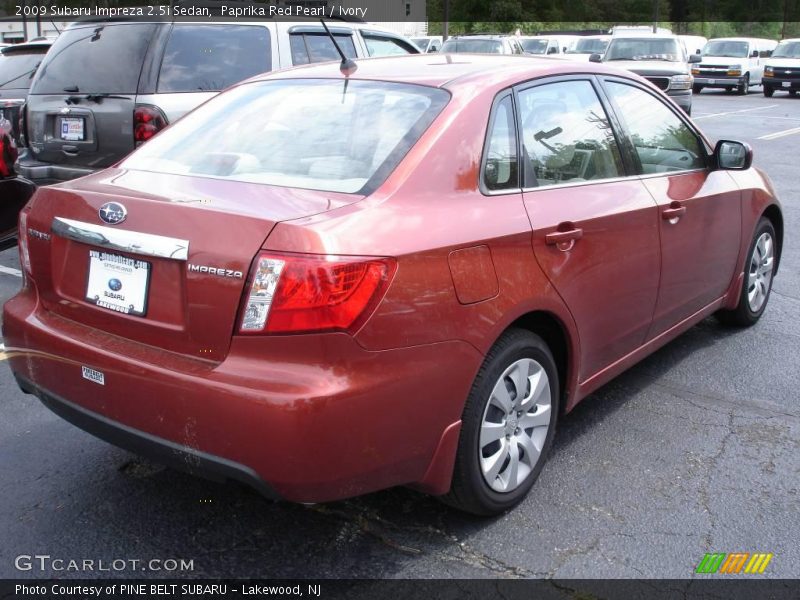 Paprika Red Pearl / Ivory 2009 Subaru Impreza 2.5i Sedan