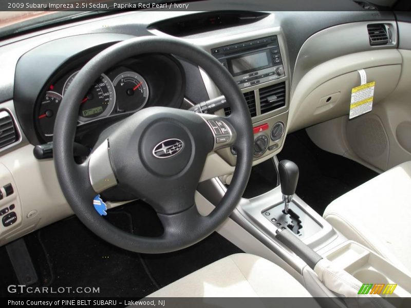 Paprika Red Pearl / Ivory 2009 Subaru Impreza 2.5i Sedan