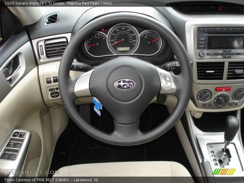 Paprika Red Pearl / Ivory 2009 Subaru Impreza 2.5i Sedan