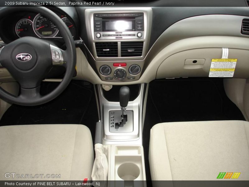 Paprika Red Pearl / Ivory 2009 Subaru Impreza 2.5i Sedan