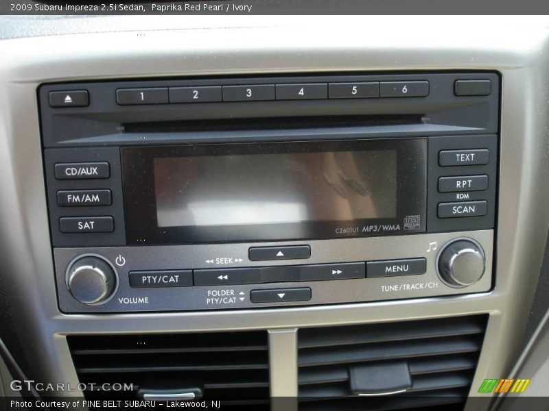 Paprika Red Pearl / Ivory 2009 Subaru Impreza 2.5i Sedan