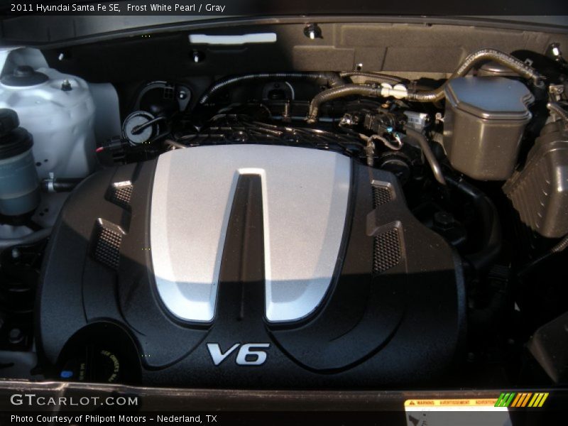 Frost White Pearl / Gray 2011 Hyundai Santa Fe SE
