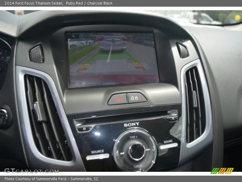 Ruby Red / Charcoal Black 2014 Ford Focus Titanium Sedan