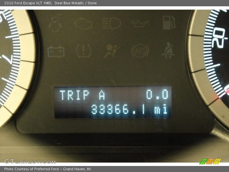 Steel Blue Metallic / Stone 2010 Ford Escape XLT 4WD