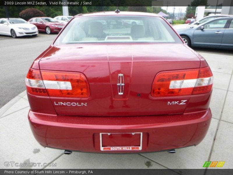 Vivid Red Metallic / Sand 2009 Lincoln MKZ Sedan