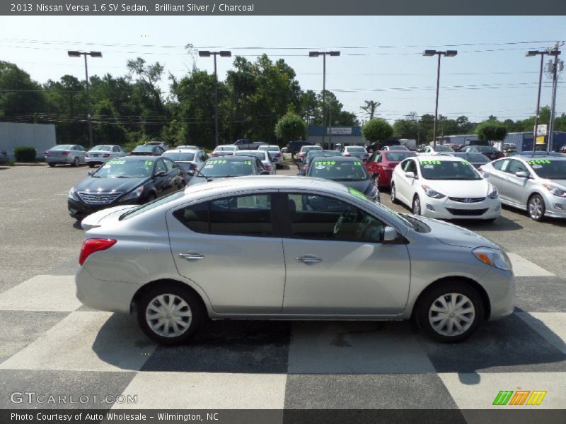 Brilliant Silver / Charcoal 2013 Nissan Versa 1.6 SV Sedan